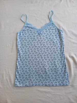 تاپ زنانه نخی بند باریک کد ۶۵۰۲8